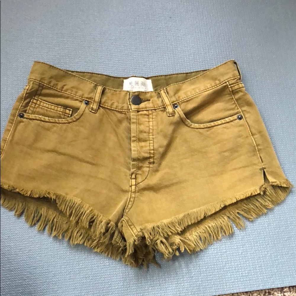 Olive denim cutoff shorts